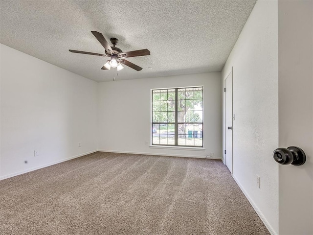 8317 Curtis Ter, Oklahoma City, OK 73132 - spare room featuring a textured ceiling, carpet, and a ceiling fan