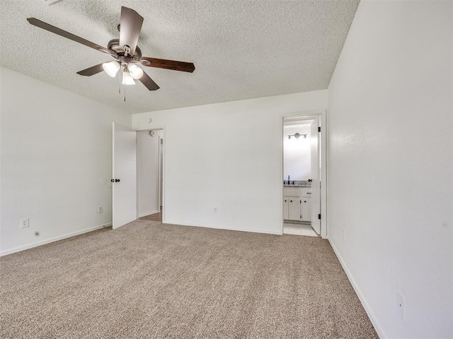 8317 Curtis Ter, Oklahoma City, OK 73132 - empty room with a textured ceiling, ceiling fan, and light colored carpet