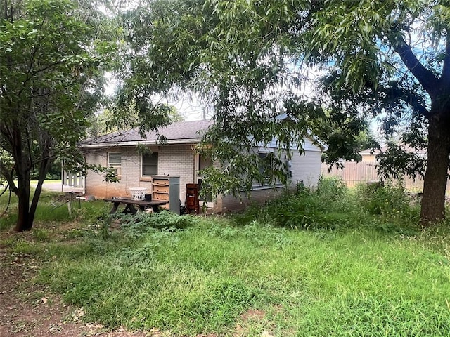 601 N Broadway St, Hobart, OK 73651 - rear view of property with brick siding