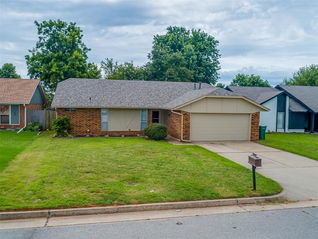10428 Fairfax Ln, Yukon, OK 73099 - view of front of house featuring brick siding, concrete driveway, and an attached garage