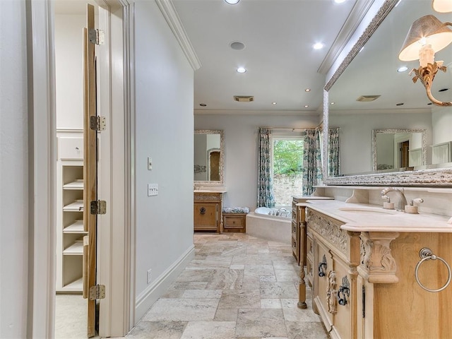 5708 Normandy Ter, Oklahoma City, OK 73142 - full bath featuring two vanities, a garden tub, crown molding, recessed lighting, and stone finish floors