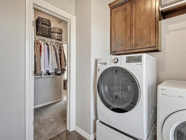 18716 Lazy Grove Dr, Edmond, OK 73012 - laundry area featuring cabinet space and independent washer and dryer
