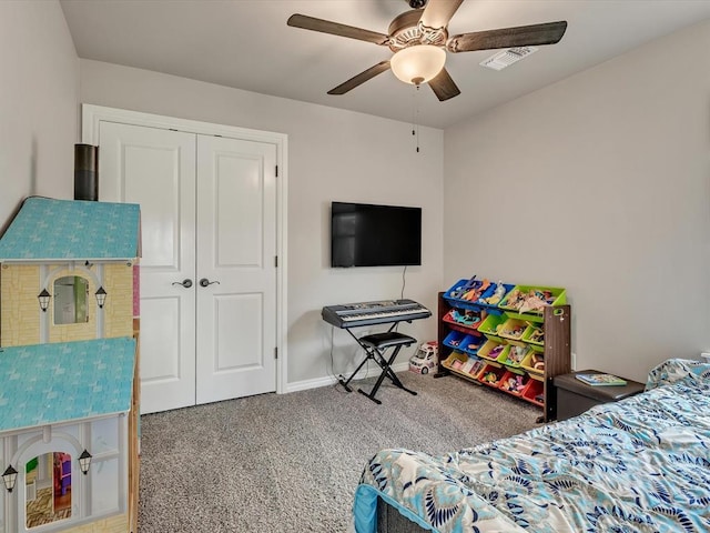 18716 Lazy Grove Dr, Edmond, OK 73012 - carpeted bedroom featuring a closet and a ceiling fan