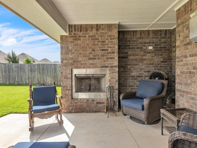 18716 Lazy Grove Dr, Edmond, OK 73012 - view of patio with an outdoor brick fireplace