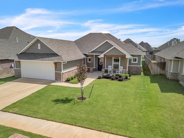 18716 Lazy Grove Dr, Edmond, OK 73012 - craftsman house featuring a porch, a garage, roof with shingles, concrete driveway, and stone siding