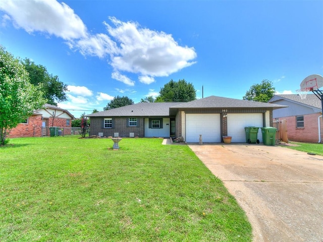502 Walnut Ave, Yukon, OK 73099 - ranch-style house with an attached garage, concrete driveway, and brick siding