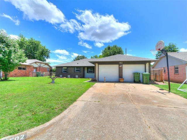 502 Walnut Ave, Yukon, OK 73099 - ranch-style home with concrete driveway, brick siding, and a garage