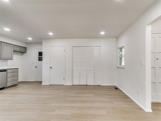 502 Walnut Ave, Yukon, OK 73099 - interior space with gray cabinets, recessed lighting, light wood-style flooring, light countertops, and dishwasher