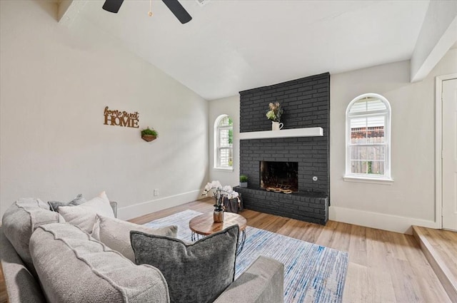 908 NW 12th St, Moore, OK 73160 - living area featuring healthy amount of natural light, ceiling fan, and wood finished floors