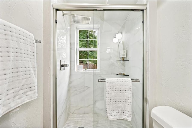 908 NW 12th St, Moore, OK 73160 - full bath featuring a marble finish shower and a textured wall
