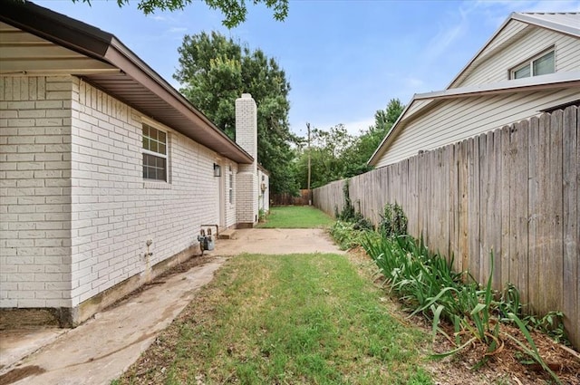 908 NW 12th St, Moore, OK 73160 - fenced backyard featuring a patio