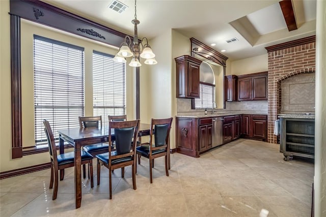 1704 NW 171st St, Edmond, OK 73012 - dining room featuring a chandelier and light tile patterned flooring