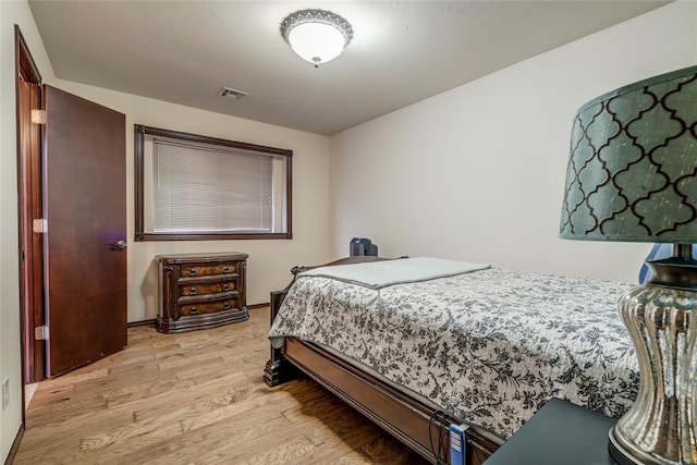 1704 NW 171st St, Edmond, OK 73012 - bedroom featuring light wood-type flooring and baseboards