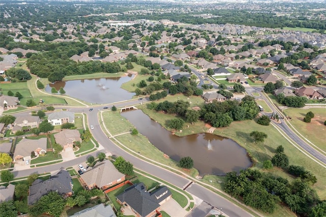 1704 NW 171st St, Edmond, OK 73012 - aerial view of property's location with a nearby body of water and nearby suburban area