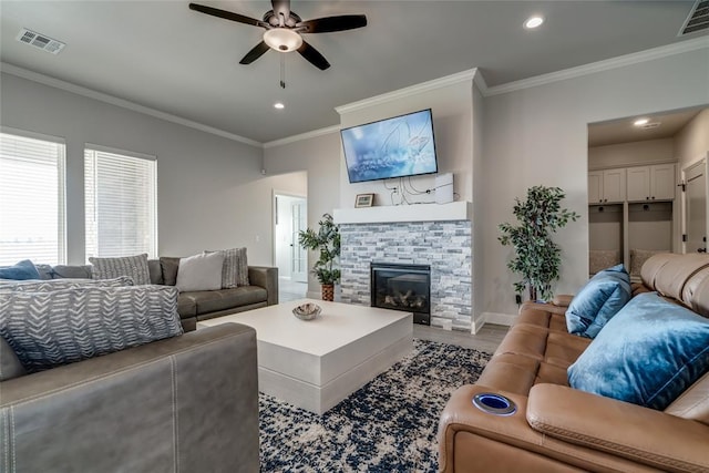 18445 Austin Pl, Edmond, OK 73012 - living area with ceiling fan, crown molding, recessed lighting, wood finished floors, and a glass covered fireplace