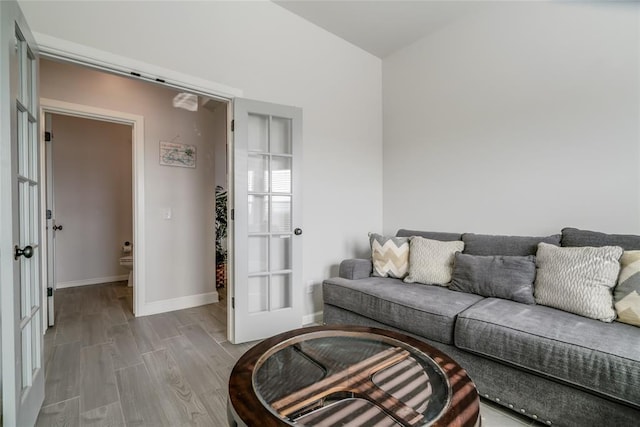 18445 Austin Pl, Edmond, OK 73012 - living room with wood finished floors and french doors