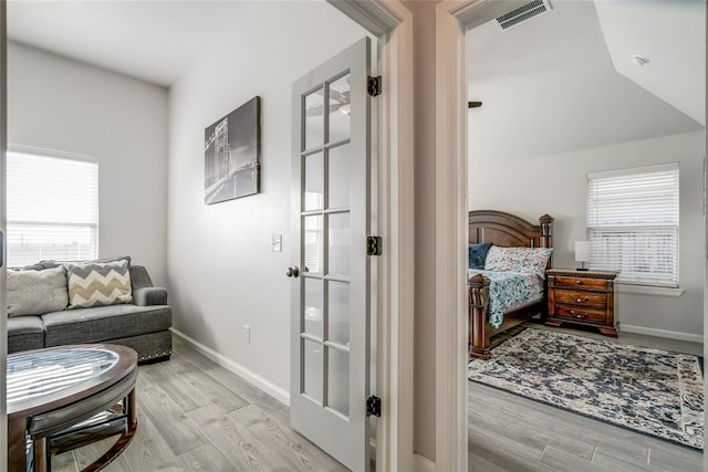 18445 Austin Pl, Edmond, OK 73012 - living area with light wood-type flooring and baseboards