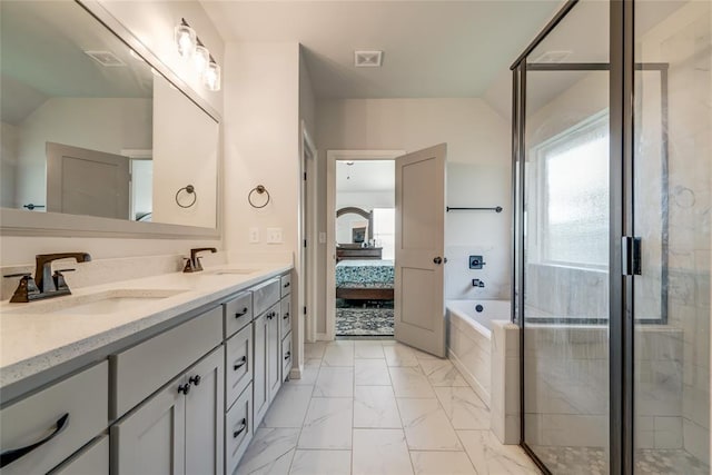 18445 Austin Pl, Edmond, OK 73012 - ensuite bathroom with marble look tile flooring, double vanity, a bath, and a stall shower