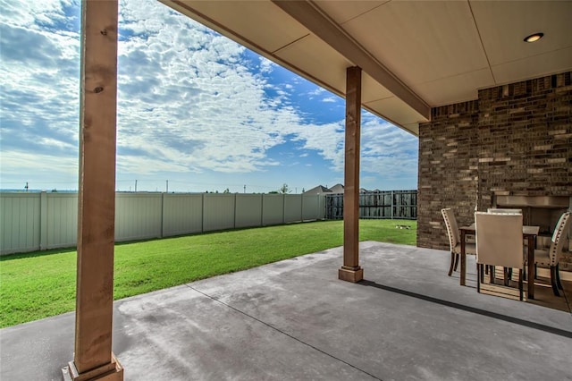 18445 Austin Pl, Edmond, OK 73012 - fenced backyard with a patio and outdoor dining space