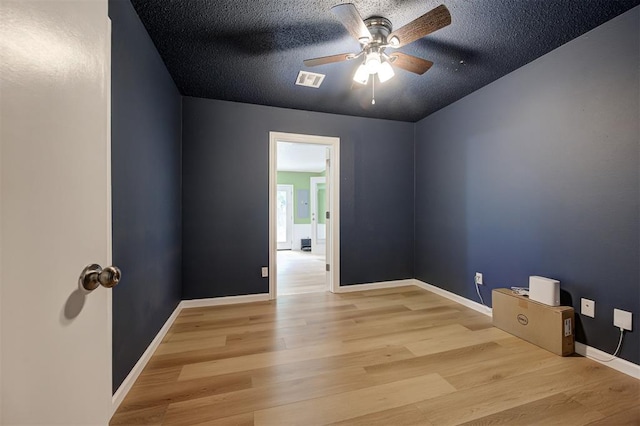 3725 N Grant Ave, Bethany, OK 73008 - empty room with ceiling fan, wood finished floors, and a textured ceiling