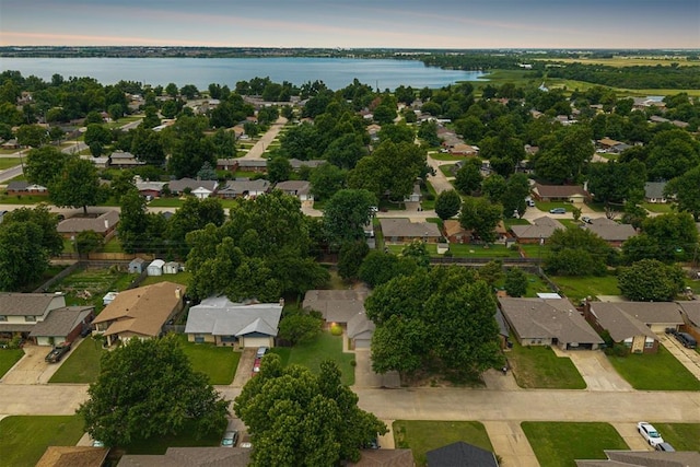 3725 N Grant Ave, Bethany, OK 73008 - aerial view of property and surrounding area featuring nearby suburban area and a large body of water