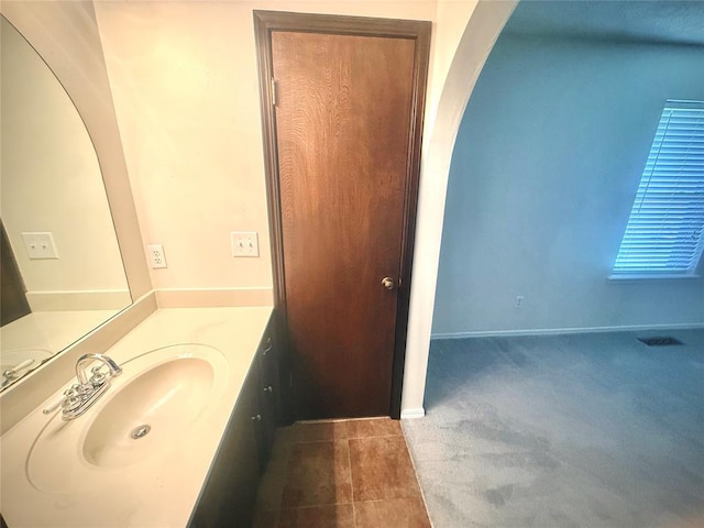 2608 SW 93rd, Oklahoma City, OK 73159 - bathroom featuring vanity and baseboards
