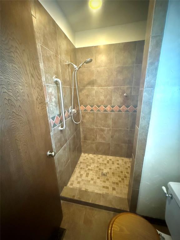 2608 SW 93rd, Oklahoma City, OK 73159 - full bathroom with tiled shower