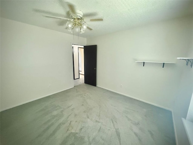2608 SW 93rd, Oklahoma City, OK 73159 - empty room featuring a ceiling fan, carpet, and a textured ceiling