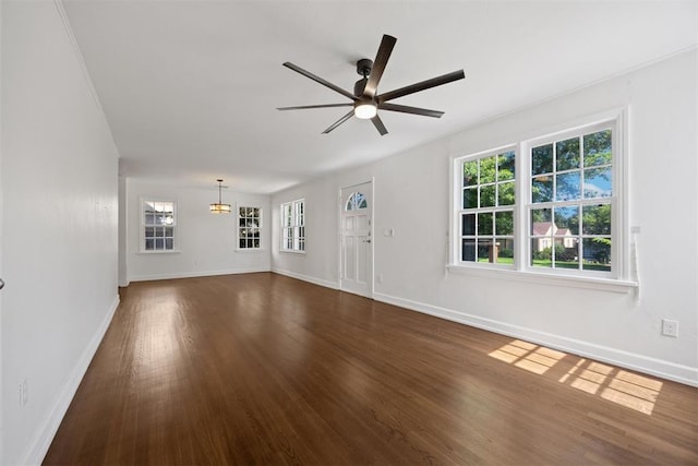 536 NW 48th St, Oklahoma City, OK 73118 - unfurnished living room with a ceiling fan and wood finished floors