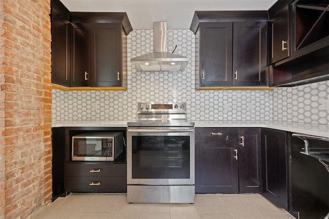536 NW 48th St, Oklahoma City, OK 73118 - kitchen with stainless steel appliances, wall chimney exhaust hood, light countertops, decorative backsplash, and open shelves