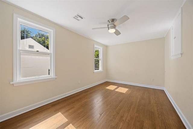 536 NW 48th St, Oklahoma City, OK 73118 - spare room featuring wood finished floors and ceiling fan