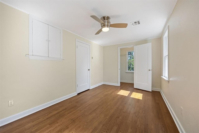 536 NW 48th St, Oklahoma City, OK 73118 - spare room with wood finished floors and a ceiling fan