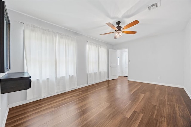 536 NW 48th St, Oklahoma City, OK 73118 - spare room featuring a ceiling fan and wood finished floors