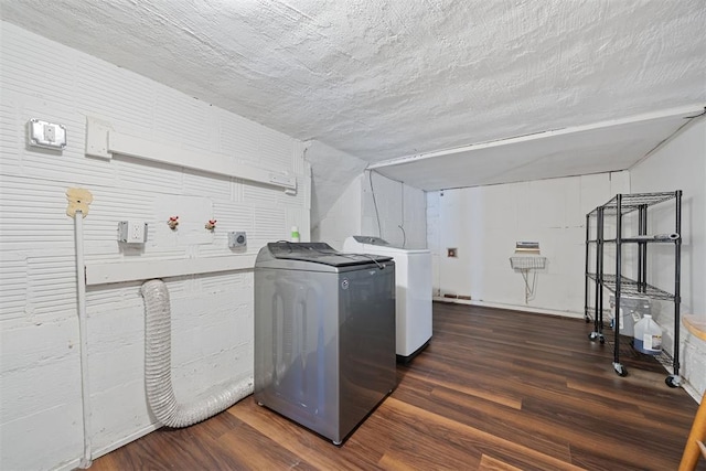 536 NW 48th St, Oklahoma City, OK 73118 - laundry room with wood finished floors and washing machine and clothes dryer