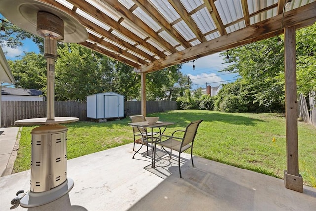 536 NW 48th St, Oklahoma City, OK 73118 - fenced backyard with a storage shed, a patio area, outdoor dining area, and a pergola