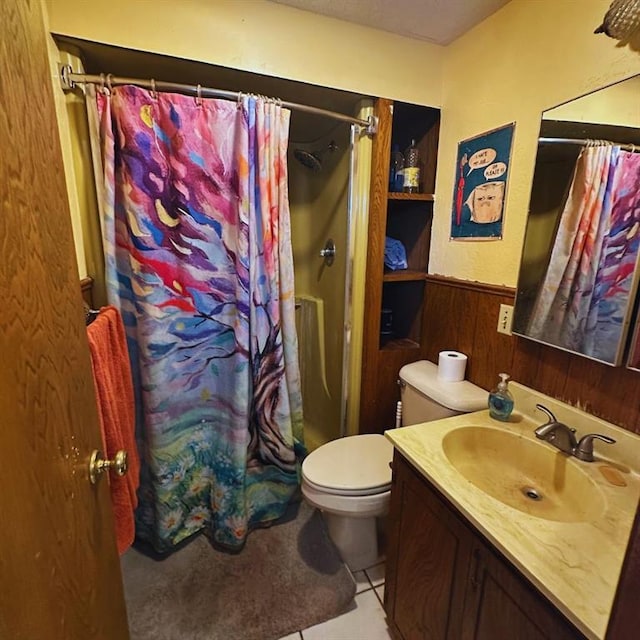 701 S 18th St, Clinton, OK 73601 - bathroom featuring a shower with shower curtain, vanity, a wainscoted wall, wooden walls, and tile patterned flooring