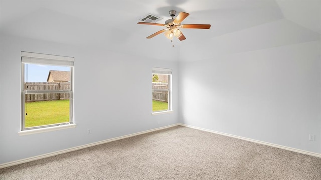 3021 NW 179th Ct, Edmond, OK 73012 - carpeted empty room featuring healthy amount of natural light, a ceiling fan, and vaulted ceiling
