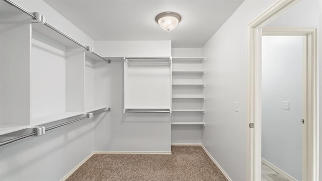 3021 NW 179th Ct, Edmond, OK 73012 - walk in closet with carpet floors