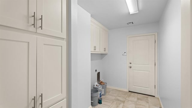 3021 NW 179th Ct, Edmond, OK 73012 - laundry room featuring electric dryer hookup and cabinet space