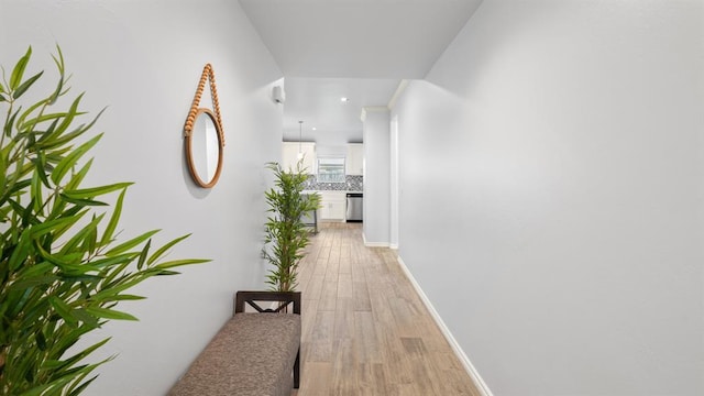 3021 NW 179th Ct, Edmond, OK 73012 - corridor with light wood-style floors and baseboards