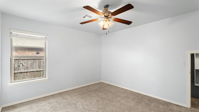 3021 NW 179th Ct, Edmond, OK 73012 - carpeted empty room featuring ceiling fan and baseboards