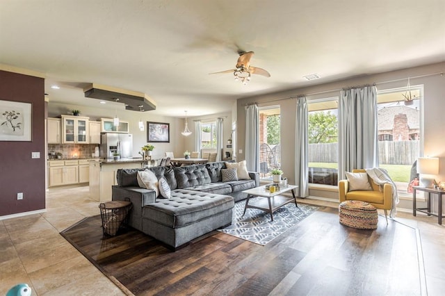 17425 White Hawk Dr, Edmond, OK 73012 - living area with ceiling fan and light tile patterned flooring