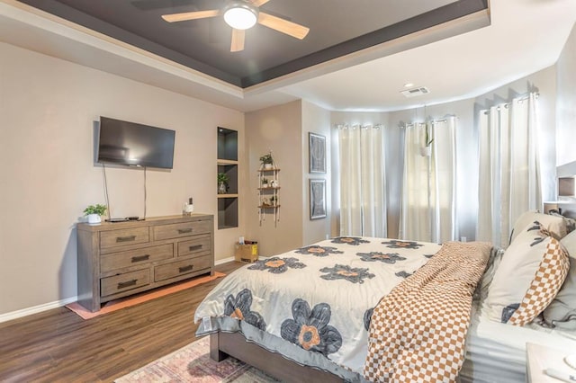 17425 White Hawk Dr, Edmond, OK 73012 - bedroom with wood finished floors and ceiling fan