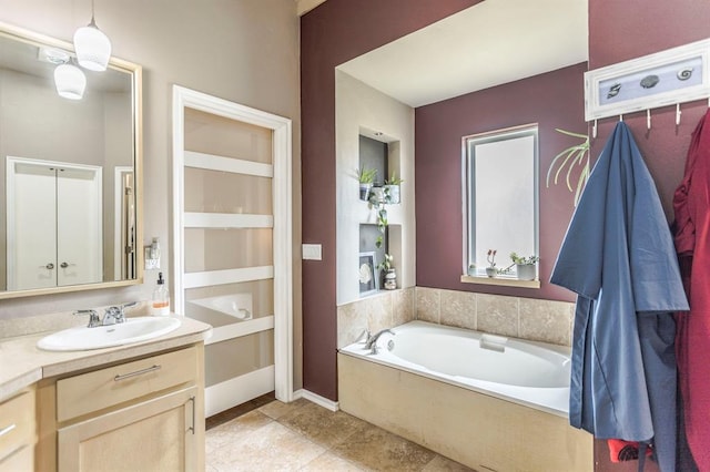 17425 White Hawk Dr, Edmond, OK 73012 - full bathroom featuring a bath, vanity, and tile patterned flooring