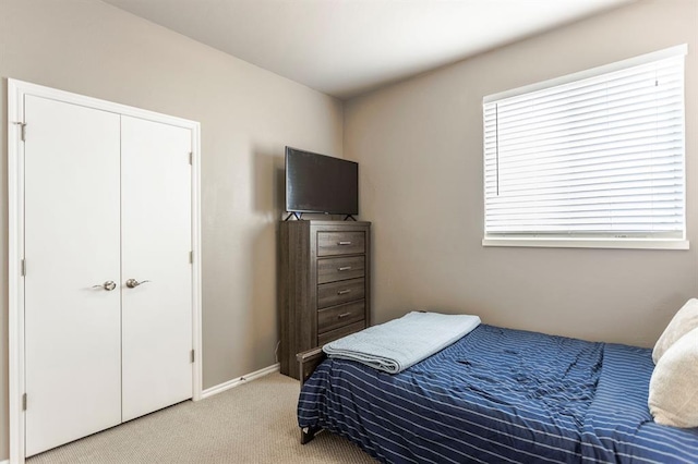 17425 White Hawk Dr, Edmond, OK 73012 - carpeted bedroom with baseboards