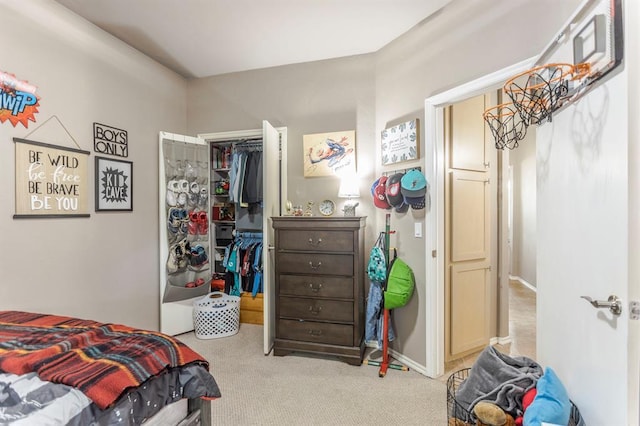 17425 White Hawk Dr, Edmond, OK 73012 - bedroom featuring a closet, carpet flooring, and a spacious closet
