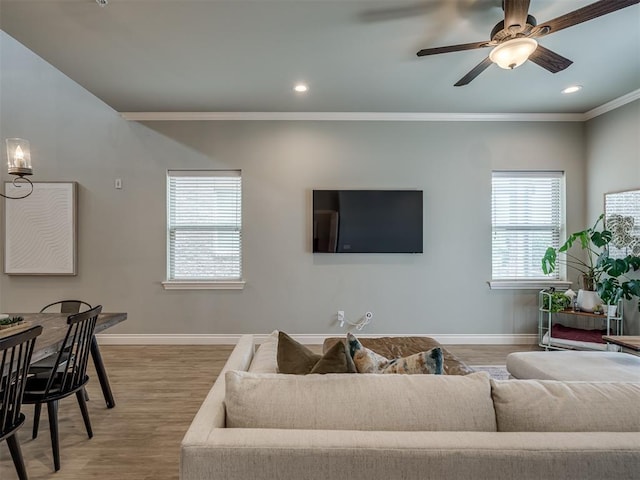 4800 Stelens Ct, Norman, OK 73071 - living area featuring crown molding, light wood finished floors, ceiling fan, and recessed lighting