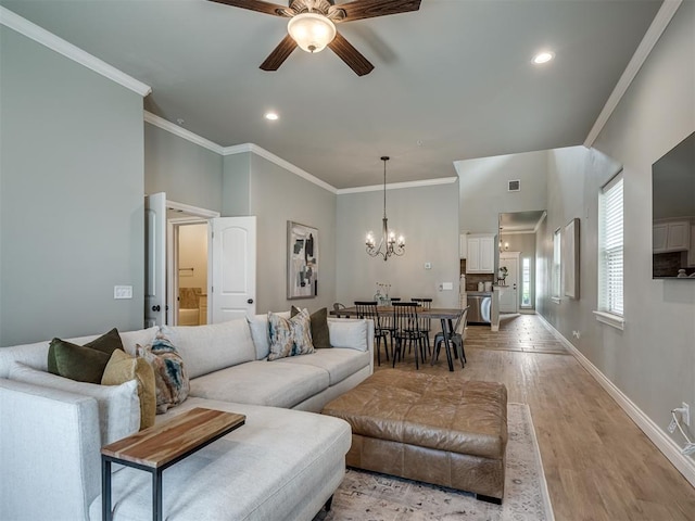 4800 Stelens Ct, Norman, OK 73071 - living room featuring ceiling fan, a chandelier, light wood-style floors, ornamental molding, and recessed lighting
