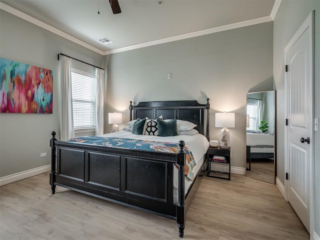 4800 Stelens Ct, Norman, OK 73071 - bedroom featuring wood finished floors, ornamental molding, and a ceiling fan