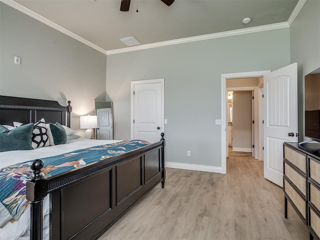 4800 Stelens Ct, Norman, OK 73071 - bedroom with ornamental molding, light wood finished floors, and a ceiling fan